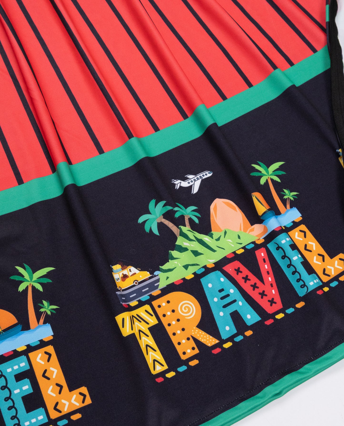 Dark Orange Black Stripes Swim Wear With Travel Printed Objects On Black Base